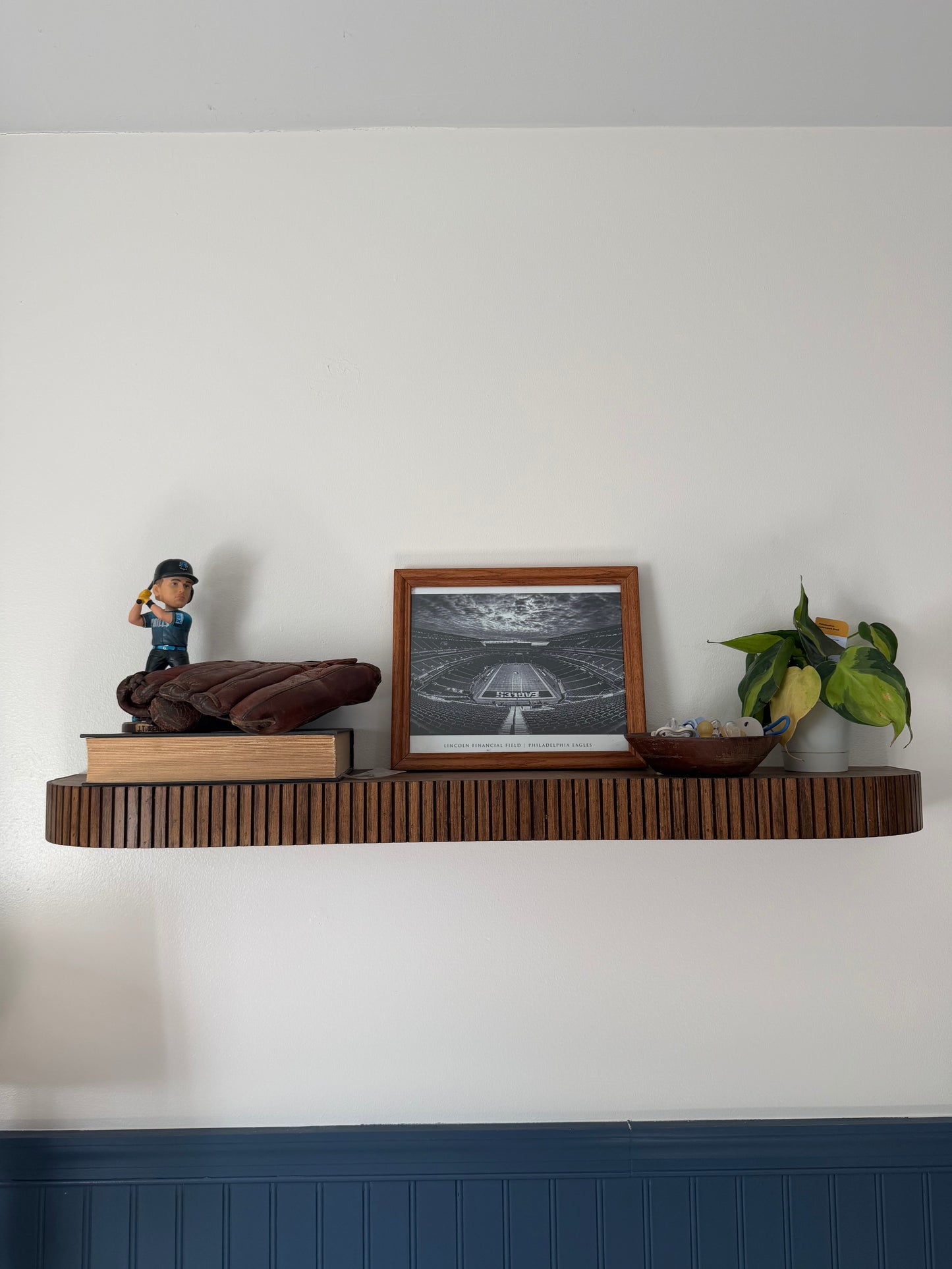 Custom rounded fluted floating shelf
