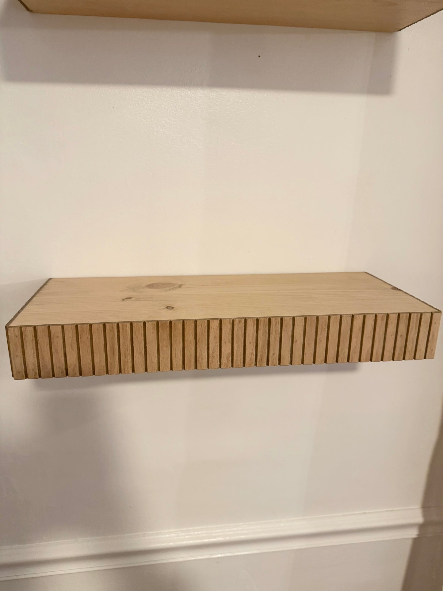 Custom squared fluted floating shelf